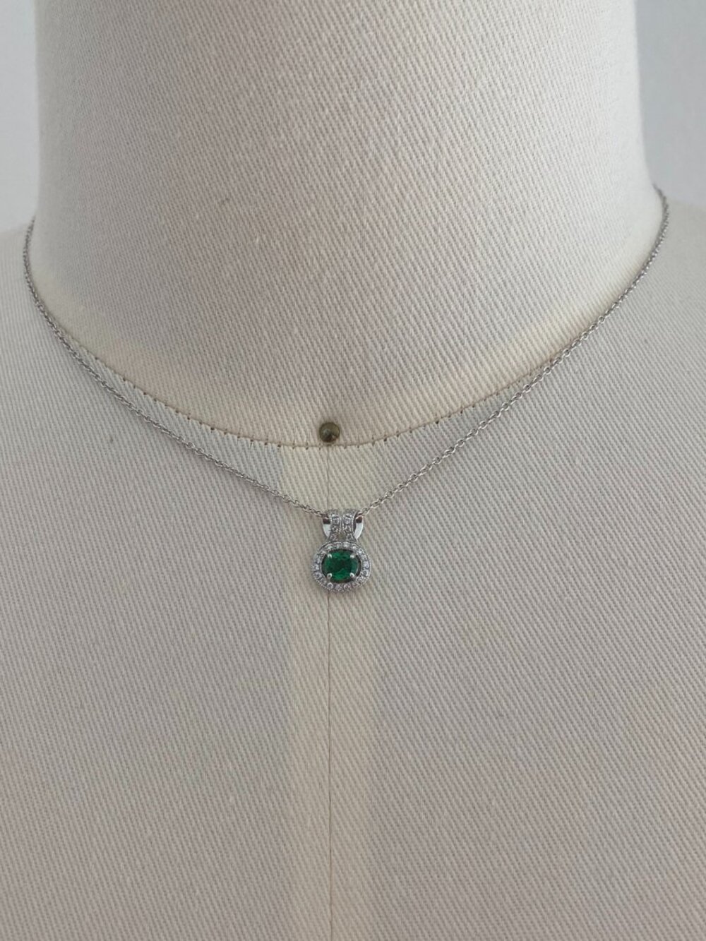 Costume emerald colored stone pendant